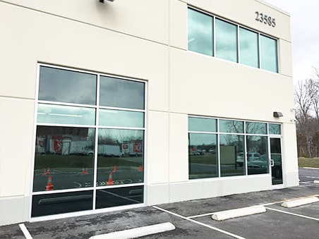 2 story commercial building with the windows tinted.